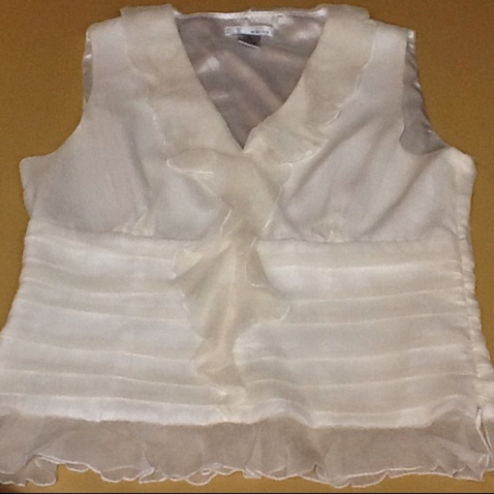 Ruffled polyester sleeveless top, size 8.